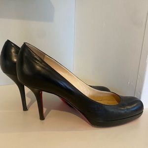 Gorgeous black leather Christian Louboutins heels!